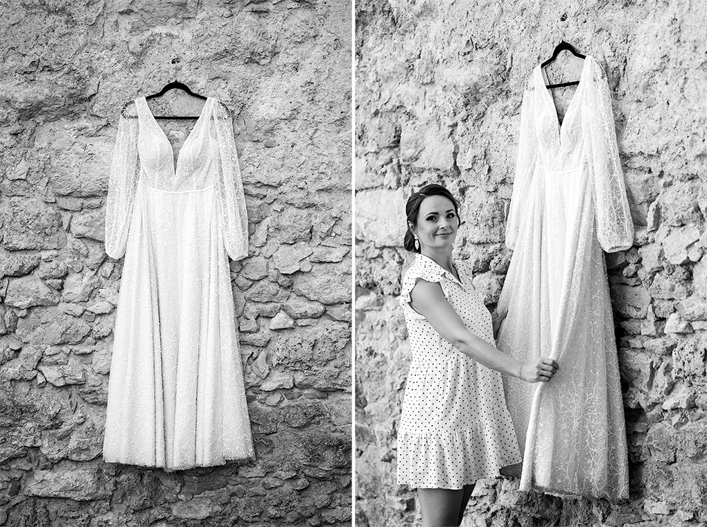 Nevesta pri svadobných šatách na historickom kamennom múre kláštora Katarínka.